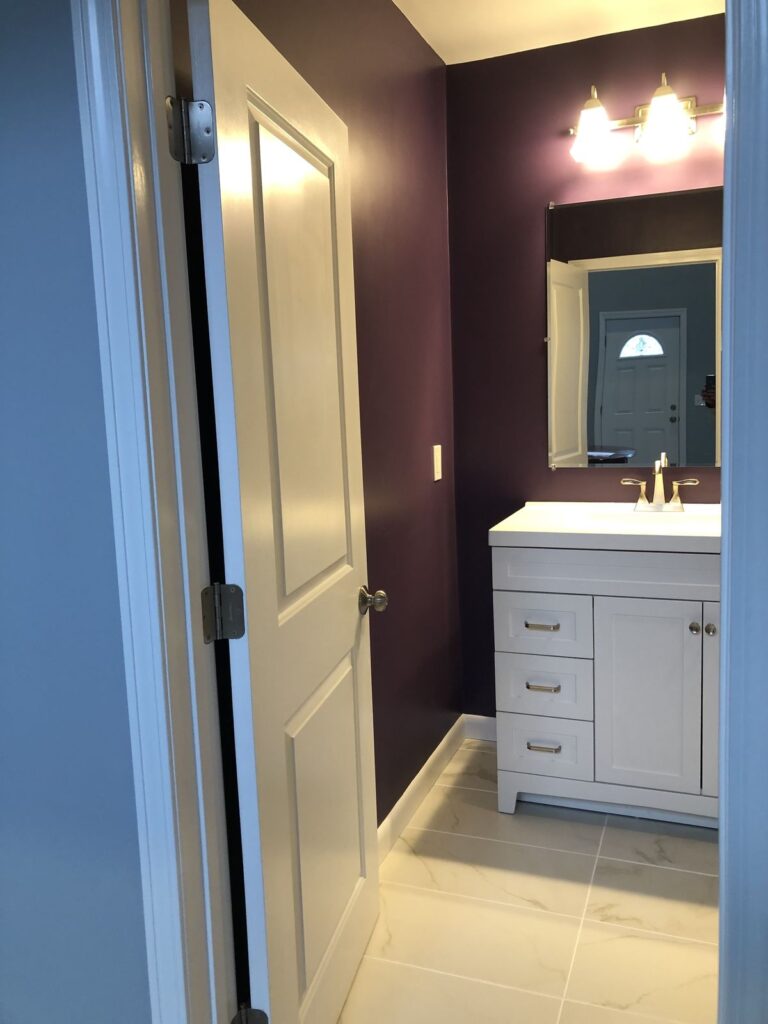 Bathroom vanity seen through the doorway in the Bellingham, MA addition