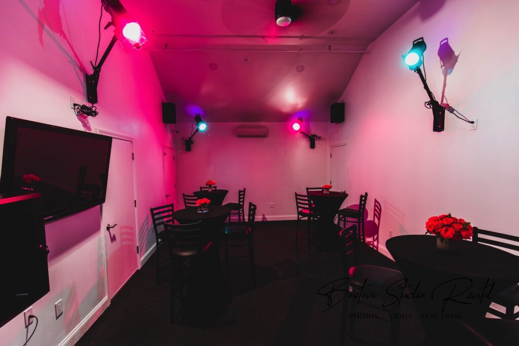 Finished studio lounge with colored lighting in Boston