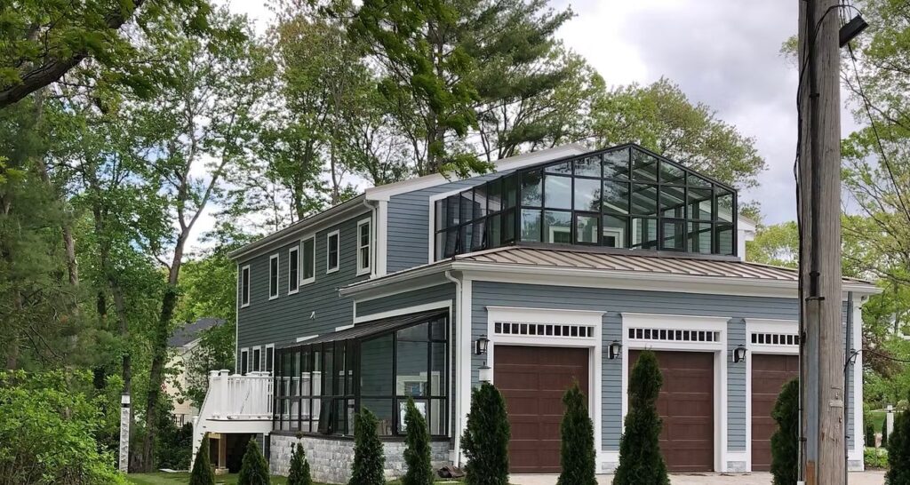 New home with glass sunroom in Wellesley, MA built by Appena Properties