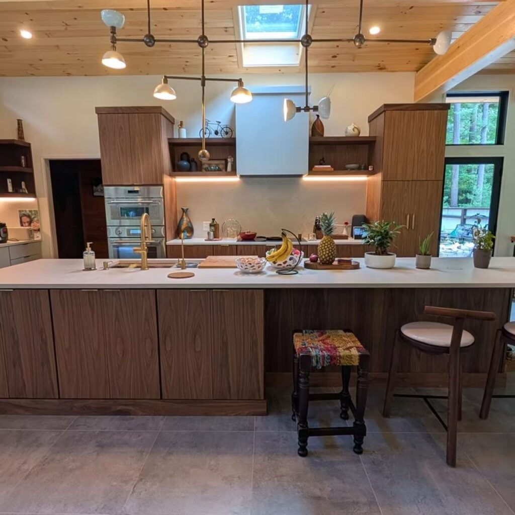 Remodeled kitchen with wood cabinets and island in Lincoln, MA