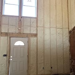 Spray foam insulation on the walls of a new addition