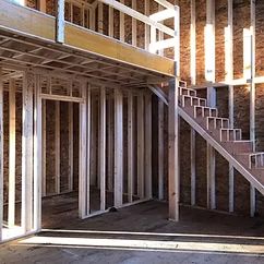 Interior wall and stair framing in a house addition